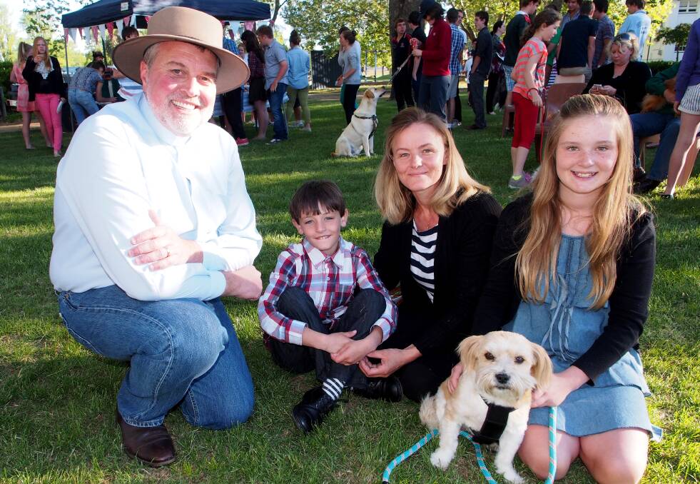 ALL SAINTS' COLLEGE BLESSING OF THE ANIMALS: Reverend Tony Car with James, Olga and Natalia Burgess and Blocker.