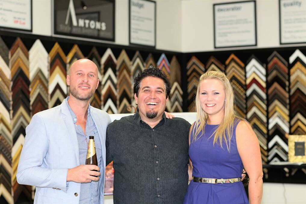 FRAME EFFECT GRAND OPENING: Andrew Steinborn from Bellini Fine Moulding with Matt Kath and Sarina Oswald. 