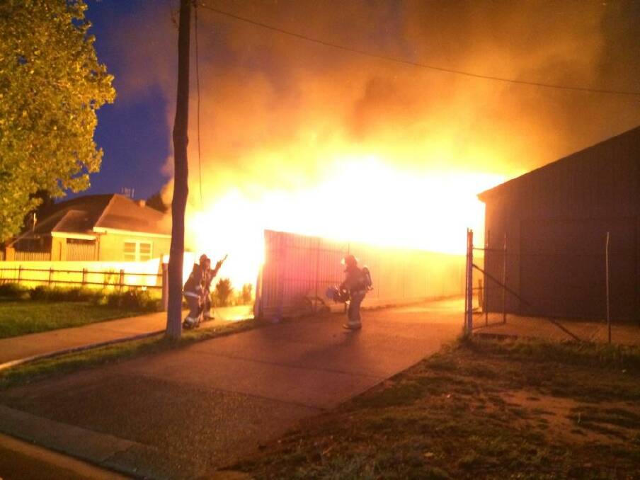 Firefighters and police were quickly on the scene at the Havannah Street fire. Photos: NSW POLICE FORCE