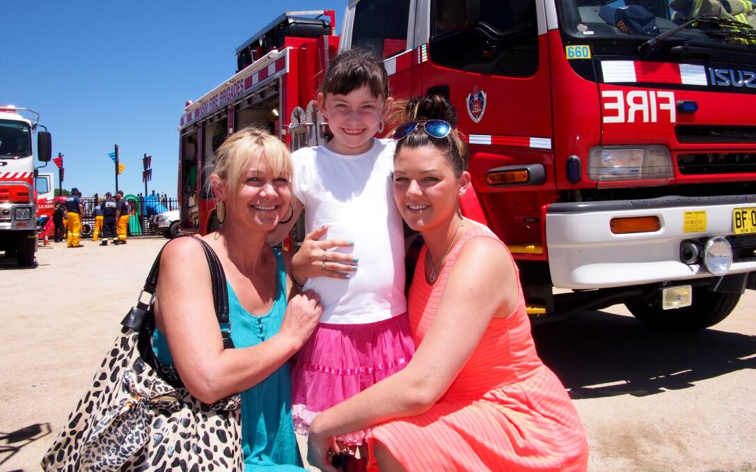 HUTCHISON BUILDERS AND MASTERS BUSHFIRES FUNDRAISER: Nikki and Taylor Kildea with Lilly Oxley, 6.