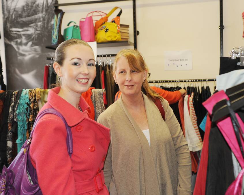 HAVING FUN: Natasha Rimmer and Lynette Sewell hunting for bargains during Crazy Day last week. 