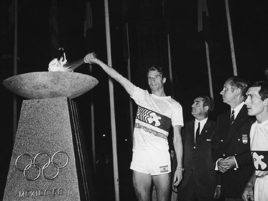 The Olympic torch arrives in Madrid, on its way to the opening ceremony of the Mexico Olympics, 5th September 1968. Photo: Getty Images