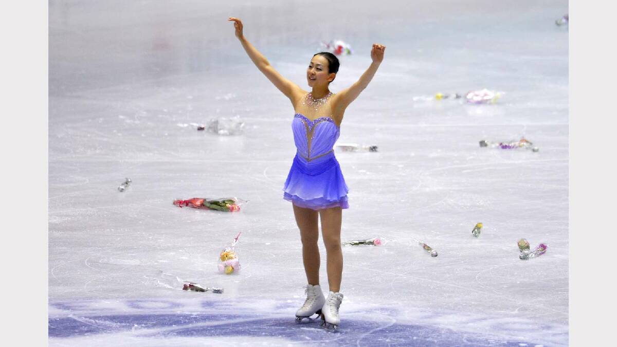 Mao Asada of Japan waves to fans during day one of ISU Grand Prix of Figure Skating 2013/2014 NHK Trophy at Yoyogi National Gymnasium. Picture: Getty Images