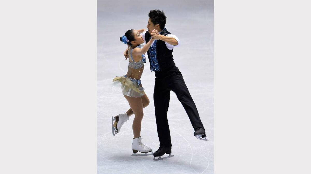 Wenjing Sui and Cong Han of China compete in the pair short program during day one of ISU Grand Prix of Figure Skating 2013/2014 NHK Trophy at Yoyogi National Gymnasium. Picture: Getty Images