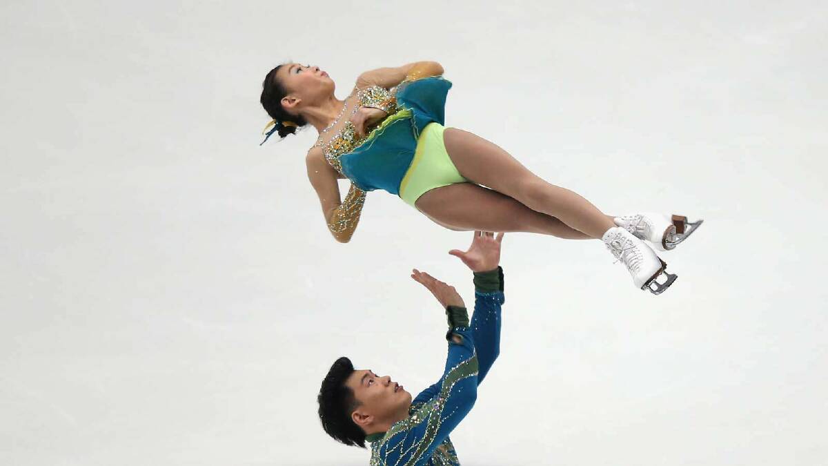 Cheng Peng and Hao Zhang of China skate in the Pairs Free Skating during Lexus Cup of China ISU Grand Prix of Figure Skating 2013 at Beijing Capital Gymnasium. Picture: Getty Images