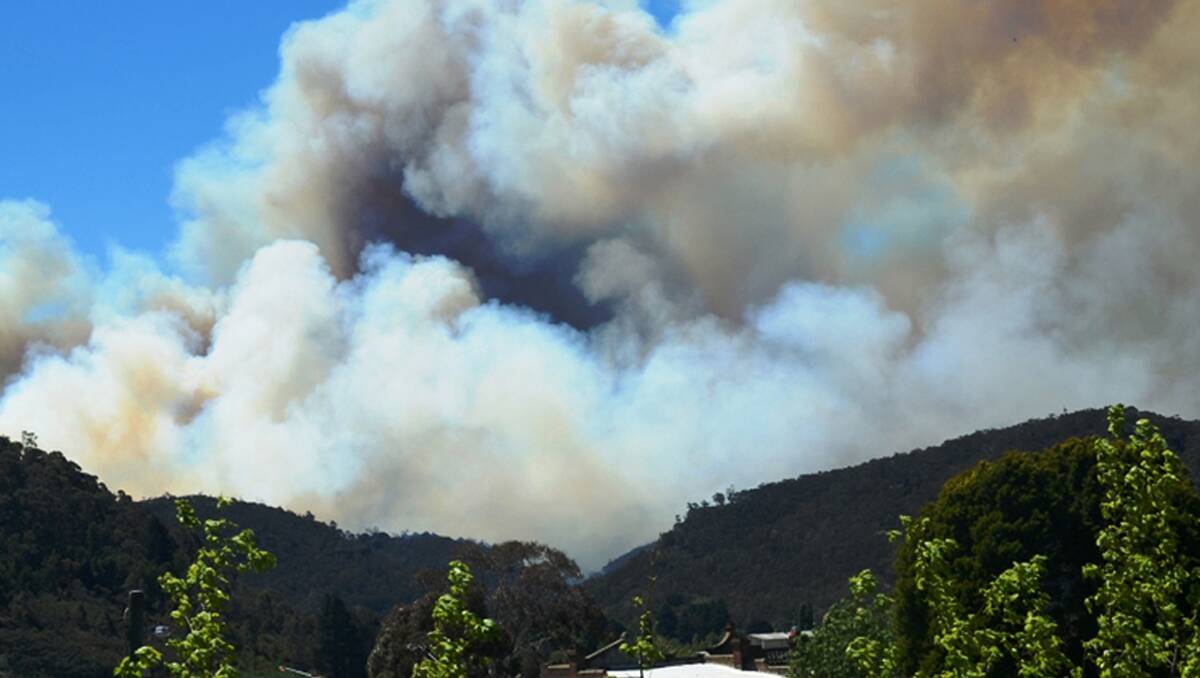 A bushfire, which started at the Marrangaroo Army Range has been pushed by westerly winds to the State Mine Gully Area