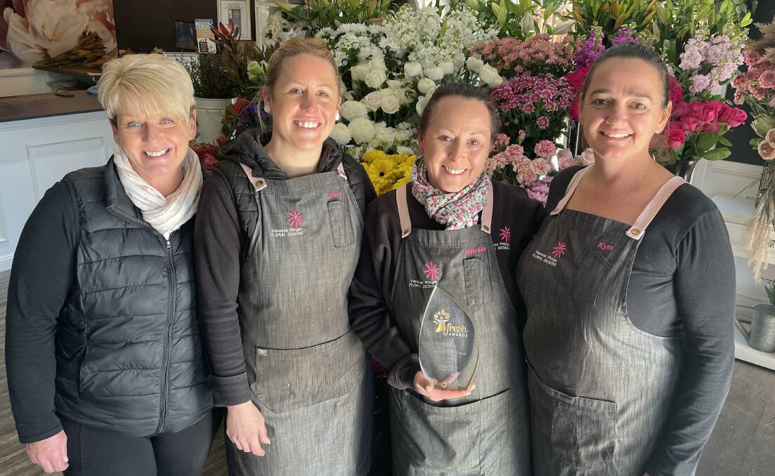 Vanessa Pringle Floral Designs staff Amanda Stapleton, Tracy Honeysett, Vanessa Pringle and Kym Westwood with their NSW and ACT Sydney Market Fresh Awards florist of the year trophy. Picture by Amy Rees.
