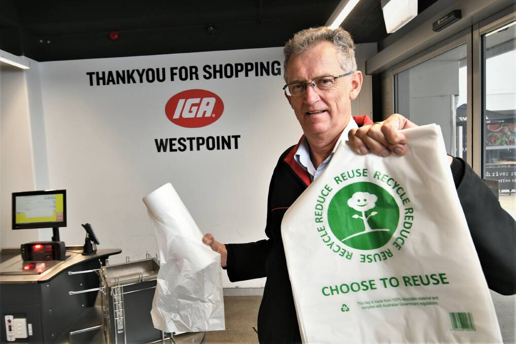 PHASED OUT: IGA's Hamish Thompson ready to stop suppling customers with single-use plastic bags. Photo: CHRIS SEABROOK 052322cbags