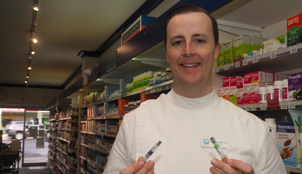 Forbutt's Pharmacy pharmacist Sam Forbutt encourages those who haven't yet had their flu shot to do so. Picture: Sam Bolt