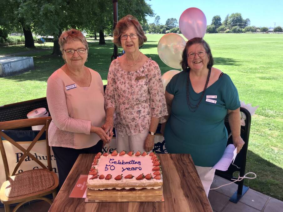50 YEARS: Bathurst Hand Weavers and Spinners Guild members Margaret Hobba, Marcia Cubis and president Sally Dunstall at the 50-year celebration. Photo: SUPPLIED.