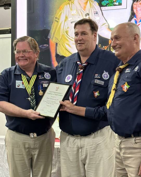Paul Hennessy (middle) with chief commissioner of Scouts NSW Neville Tomkins and The Golden West Regional commissioner David Scott celebrating 50 years as a scout. Picture supplied