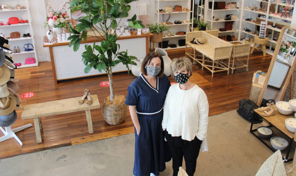 GEORGOUS SHOES: Gorgeousness owner Bron Aberley with business partner Kate Hemsworth in the new Gorgeousness shoe shop. Photo: AMY REES.