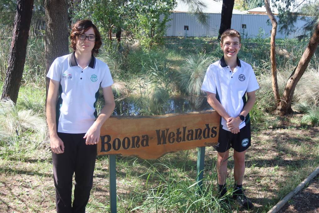 Kelso High Year 9 science students Sebastian Winterswijk and Blake Evans at the school's Boona Wetlands on April 11, where the students began practising their water testing skills. Picture by Amy Rees