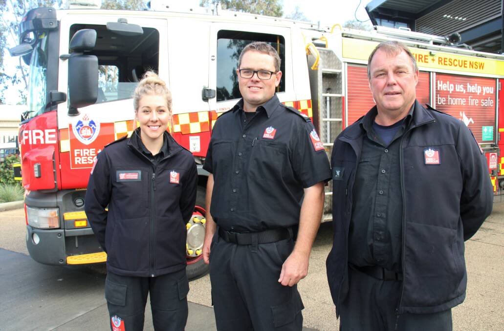 OPEN DAY: Firefighters Brydie McGregor and Michael Tener with acting station officer Tim Anderson at the Bathurst Fire Station. Photo: AMY REES.