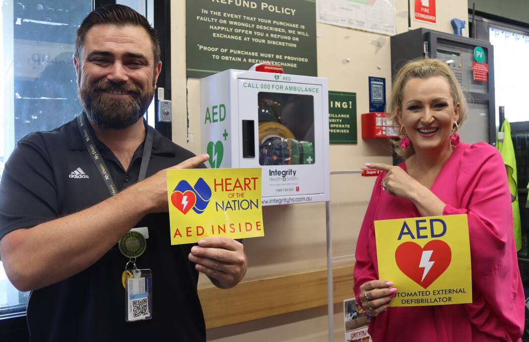 Dan Murphy's Bathurst store manager Mark Pinkerton with AED advocate Kylie Johnston. Picture by Amy Rees