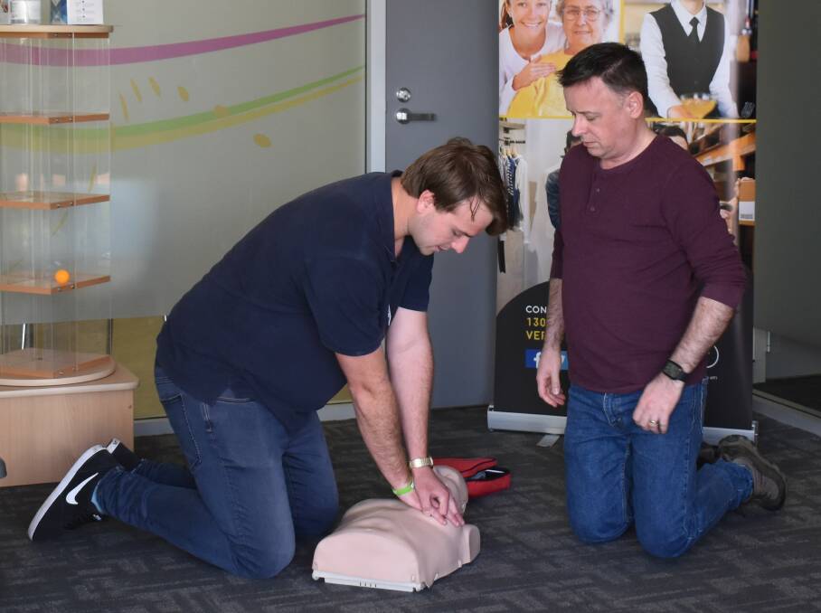 LIFESAVER: VERTO trainer Samuel Hocking demonstrates/teaches proper CPR technique to students. Photo: SUPPLIED