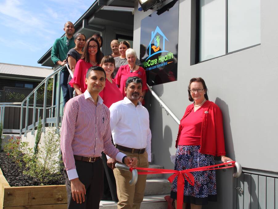 AND WE'RE OPEN: Dr Pav Phanindra with WeCare Health staff at the new medical centre's grand opening. Photo: AMY REES.