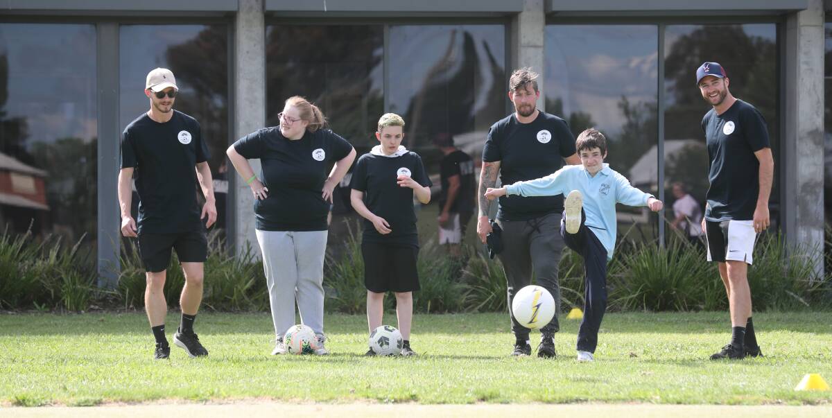 KICK OFF: Football 4 All in Bathurst has kicked off and players Brie, Alicia and Lachie with coaches Beau Yates, Adam Lawson and Ben Fry are keen to get the ball rolling. Photo: PHIL BLATCH