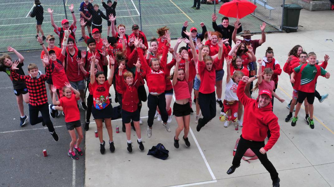 Bathurst High Campus principal Ken Barwick and students celebrating Wear Red Day last year.