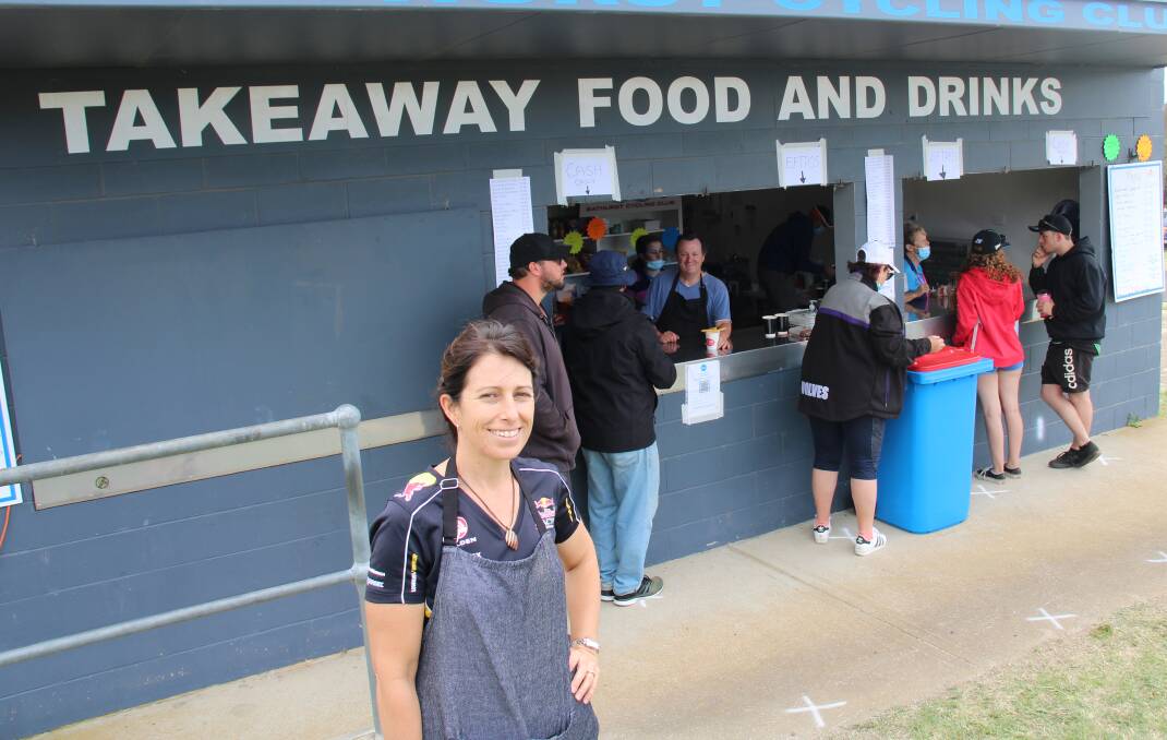 FUNDRAISER: Bathurst Cycling Club's Toireasa Gallagher with other club members running a canteen at Bathurst 1000 as their annual fundraiser. Photo: AMY REES.