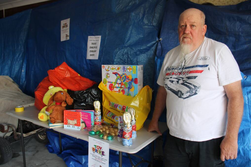 DONATIONS: Mal 'Blinky' Cave taking donations to help flood-affected people this Easter. Photo: AMY REES.