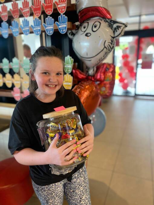 Iydian Rue with her jar of lollies after winning the guessing game at McDonald's Bathurst on McHappy Day. Picture supplied