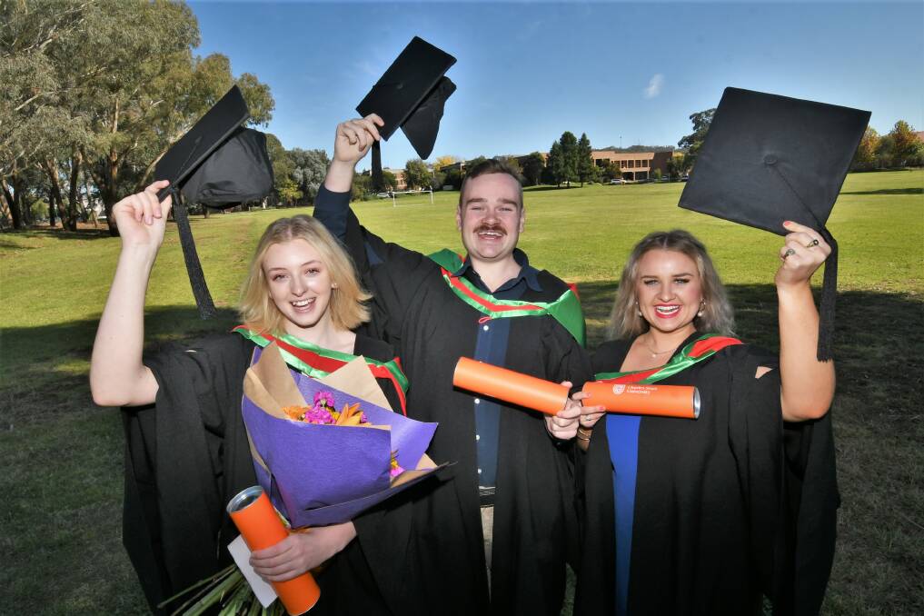 CSU GRADUATES: Claudia Bergen, Roan Van Heckeren and Lily O'Toole excited to be raduating after a long wait. Photo: CHRIS SEABROOK.
