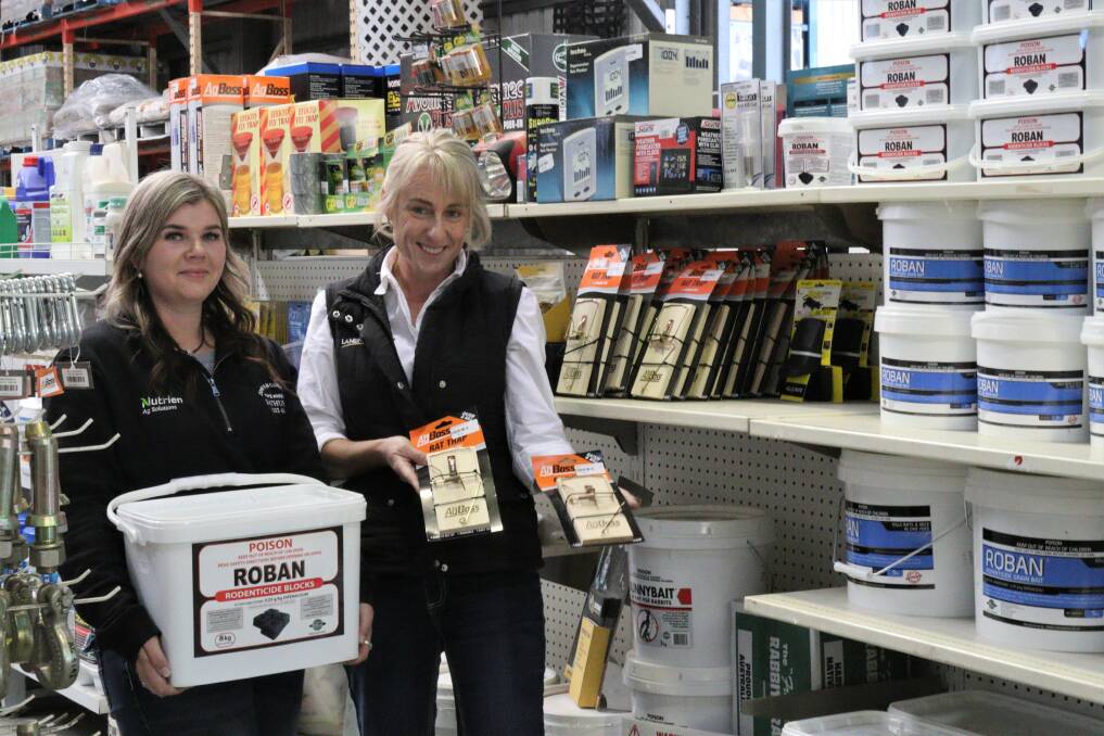NEW STOCK: Town and Country Rural Supplies employees Shania Patterson and Nicole Ball happy to have traps and bait back on the shelves.