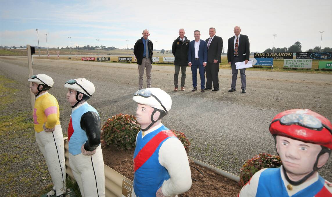 FUNDING: Bathurst Harness Racing Club chairman Wayne Barker, CEO Danny Dwyer, Member for Bathurst Paul Toole, Peter Nugent and Ross Higgins. Photo: PHIL BLATCH