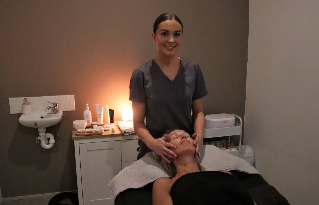 Spa therapist Caitlin giving a client a facial at the new Zenspa premises. Picture by Amy Rees