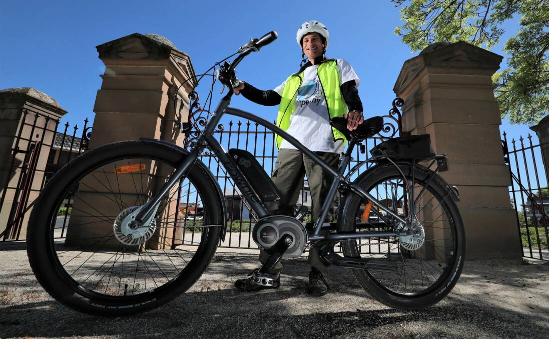 LACK OF RACKS: Bathurst cyclist Laurence Outim wants to see more bike racks in town. Photo: PHIL BLATCH