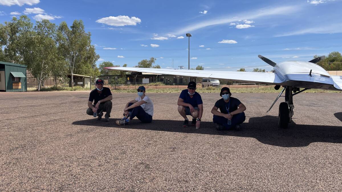 Dr Simon Quilty's COVID-19 response team seeking shelter on an extremely hot day in Katherine, NT. Picture supplied