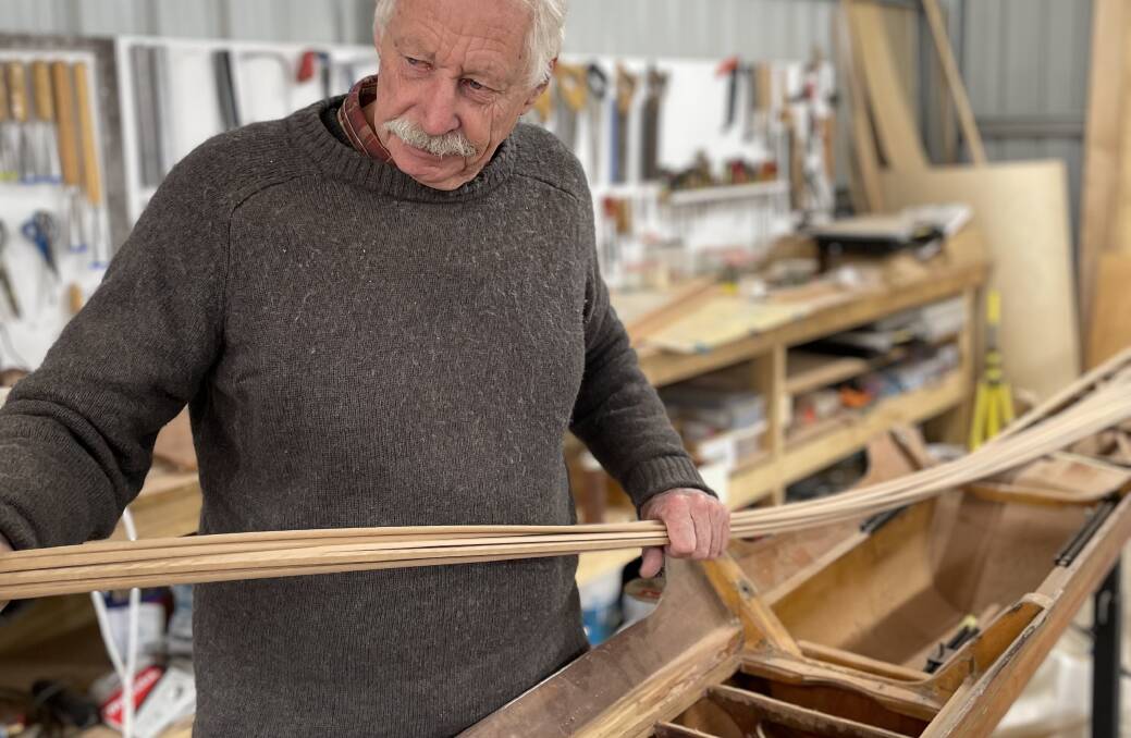 Graeme King has made and designed boats for over 50 years after a news reel sparked his curiosity. Picture: Aidan Curtis. 