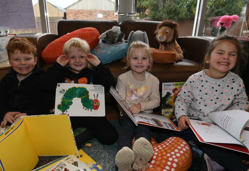 Reading at Orange Preschool. From left to right: Bailey McAnulty, Hudson Carr, Ava Crooks, and Addison Bettinzoli. Picture by Carla Freedman. 