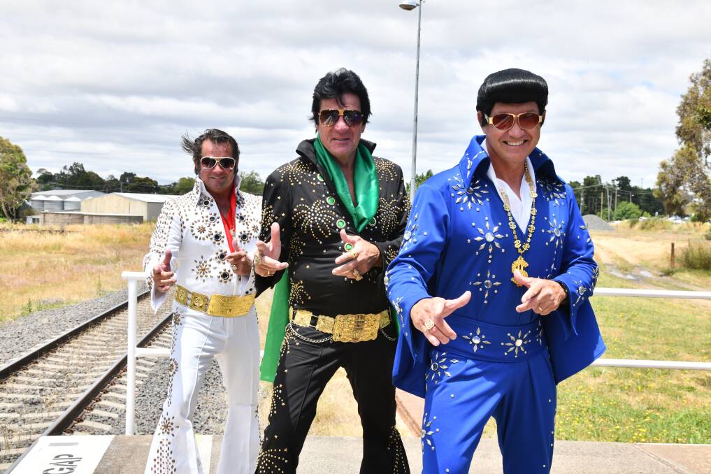 Promotional Elvises Graham Lawrence, Al Gersbach, Greg Jones at East Fork station in Orange, NSW awaiting their Elvis Express lift to the 2023 Parks Elvis Festival. Picture by Carla Freedman.
