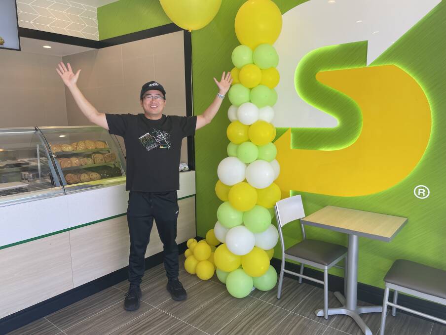 Franchisee of West Bathurst Subway, and Kelso Subway, Michael Shen, celebrating the opening of the new store. Picture by Alise McIntosh
