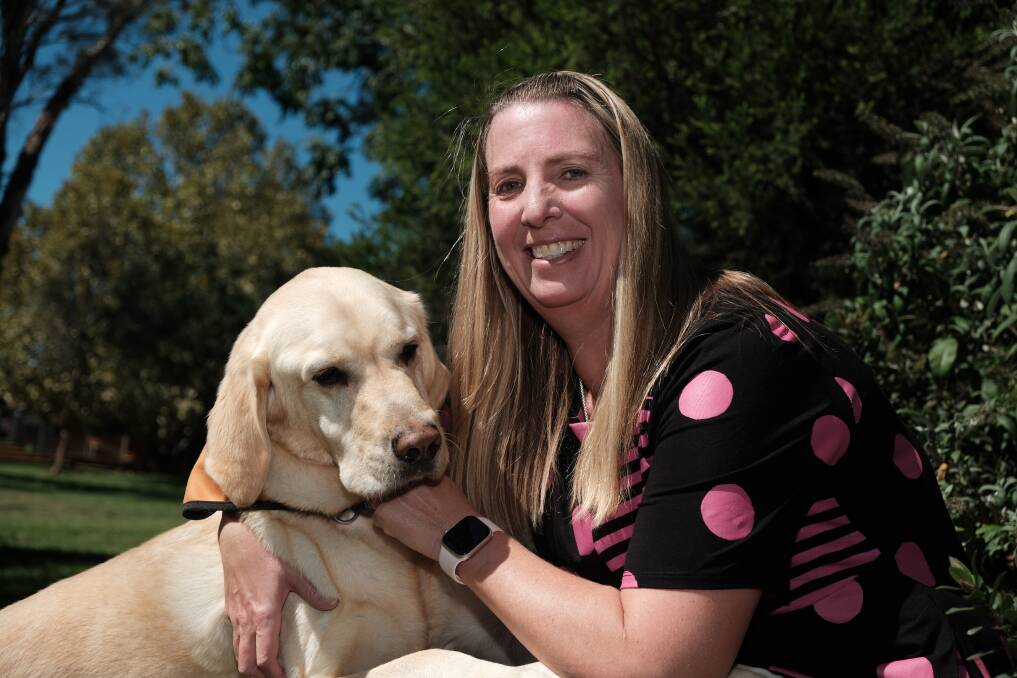Newly appointed Principal Melanie Woolmer with Hercules, the school therapy dog. Picture by James Arrow
