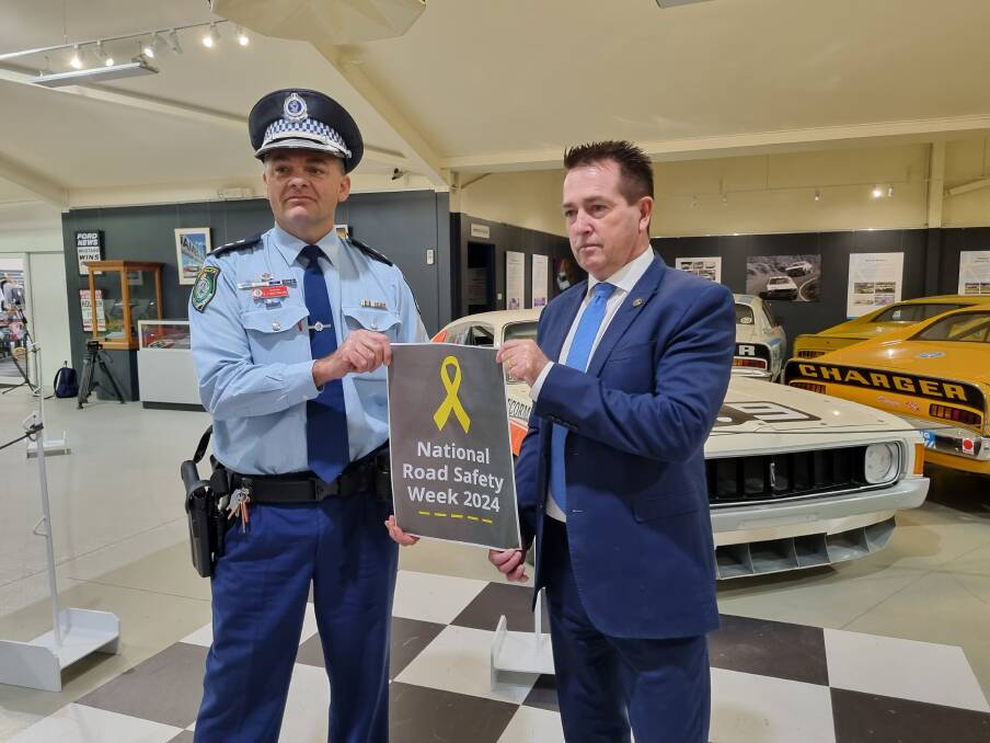 Traffic inspector of the Chifley and Central West district Ben Macfarlane with shadow minister for police, Paul Toole, were spreading the message for National Road Safety Week. Picture by Alise McIntosh 