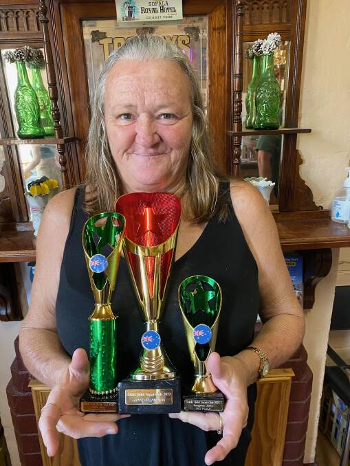 Sandra Gardiner with her grand champion trophy, and her first place trophy in the lamb jerky category, and third in the kangaroo category. Picture supplied