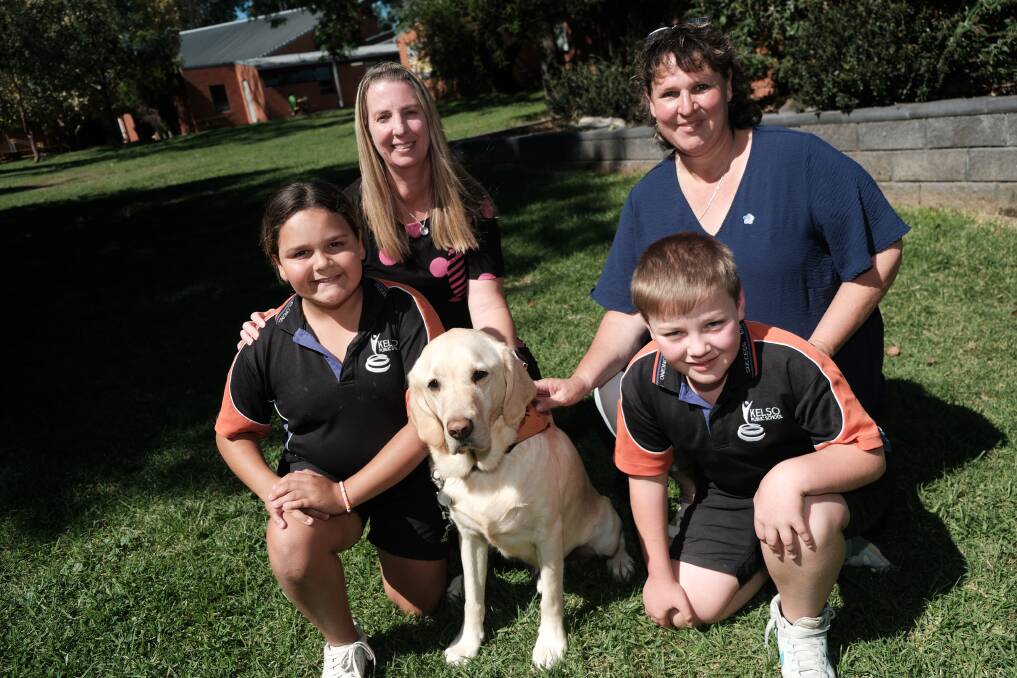 Principal Melanie Woolmer and Community Liaison Officer Deb Green with Turia Schuler [Year 5], Hercules the dog and Jack Silva [Year 5]. Picture by James Arrow.