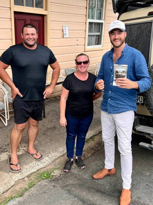 Councillor Benjamin Fry [right] enjoying last years winning jerky with the owners of the Rustic Cafe Sofala and winners of the competition. Picture supplied