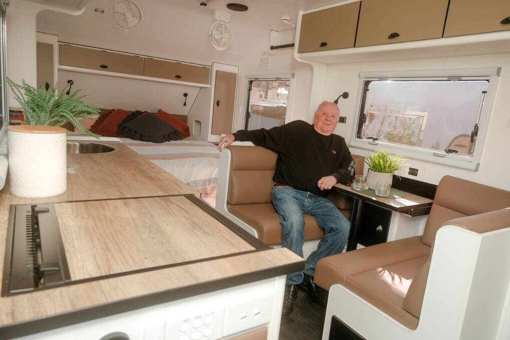 Jeffrey Leech lounging around in one of the state-of-the-art caravans that will be available during the upcoming expo. Picture by James Arrow