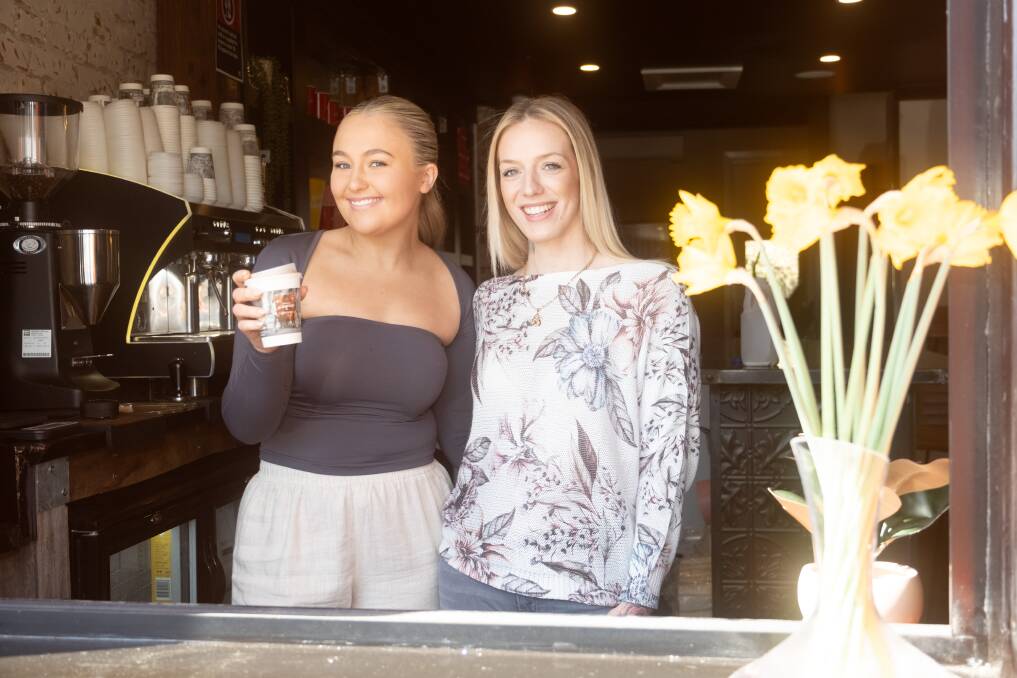 Barista and bar staff member Sophi Culnane and The 1880 Hotel manager Shanell West out the front of the latest addition to the hotel. Picture by James Arrow