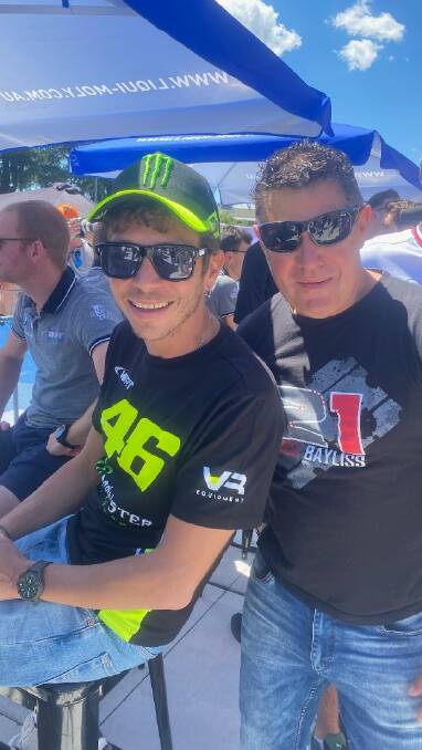 Grand Prix motorcycle racing world champion Valentino Rossi with fan, and owner of the Bathurst Aqua Park Mick Hickey. Picture supplied