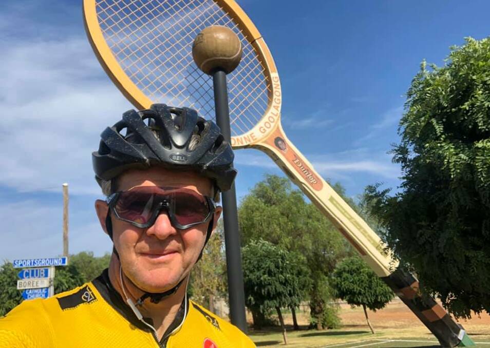 ON THE ROAD: Mark Simons takes a break in Barellan, near Griffin, on Sunday, January 12, on his ride from Bathurst to Adelaide. The town is home to Australian tennis legend Evonne Goolagong Cawley. Photo: CONTRIBUTED