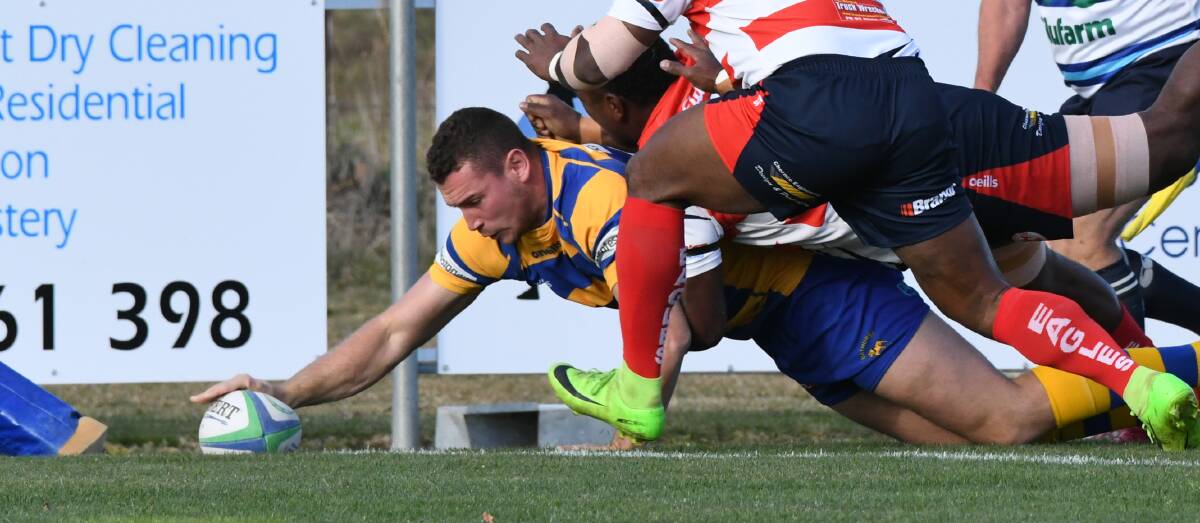 TOUCH DOWN: Bathurst Bulldogs centre Brenton Gibson reaches out for a try against Cowra earlier this month. Photo: CHRIS SEABROOK 060119cbdogs2