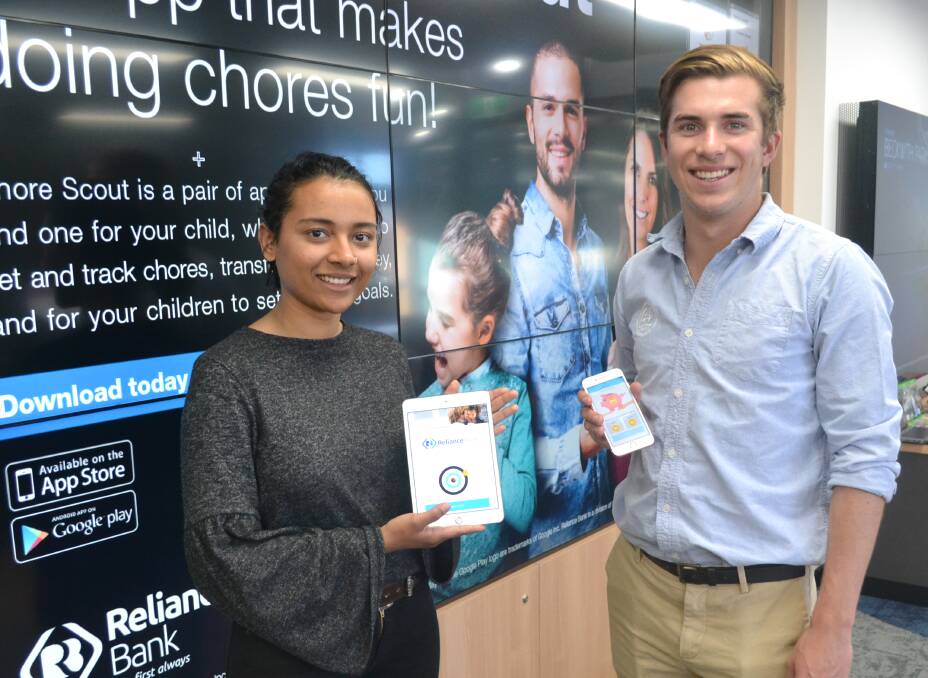 LAUNCHED: Gunthers Lane's Nayab Dure and Nick Plunkett with Reliance Bank's new app - Chore Scout. Photo: BRADLEY JURD