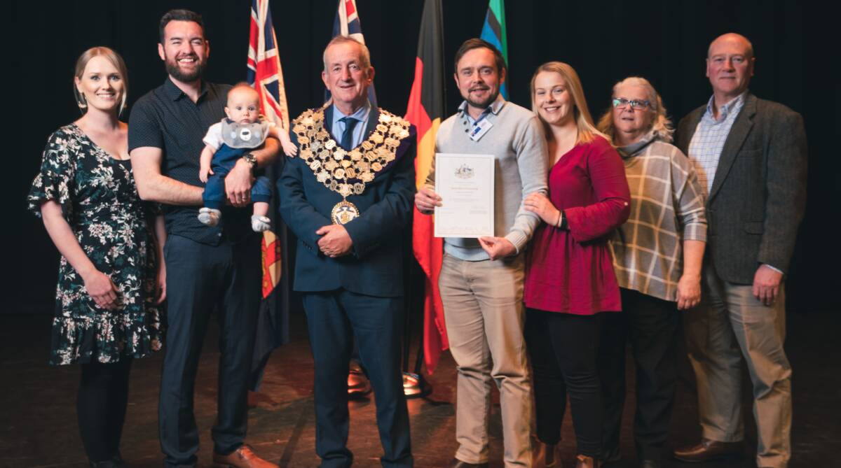 NEW: Graham Stirling and his family at Tuesday night's citizenship ceremony at Bathurst Memorial Entertainment Centre. Photo: CONTRIBUTED