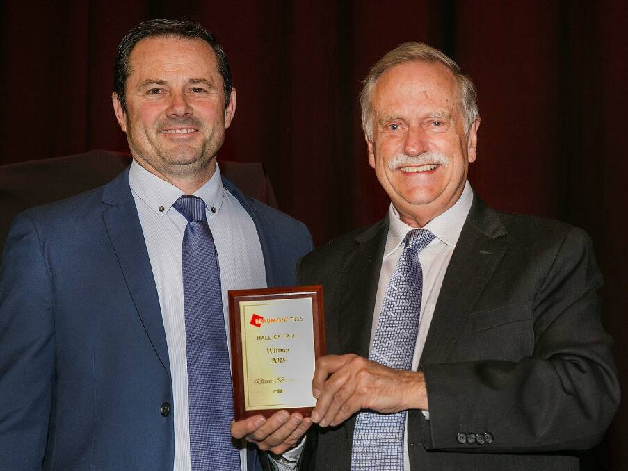 TOP HONOUR: Beaumont Tiles Bathurst store owner Dave Browning, with executive chairman Bob Beaumont. Photo: SUPPLIED