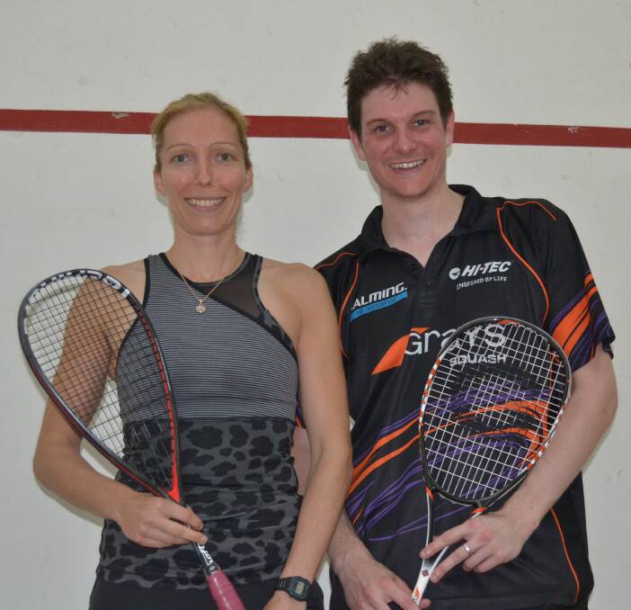 POWER PLAY: Madeline Perry and Matthew Karwalski claim bragging rights at the Bathurst Panthers Squash Open on Sunday. Photo: BRADLEY JURD 101716squash1